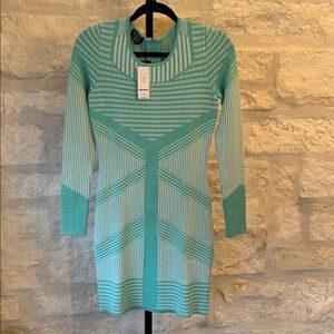 Bebe -Women Dress, Size Medium. It is a brand new dress new with tags.